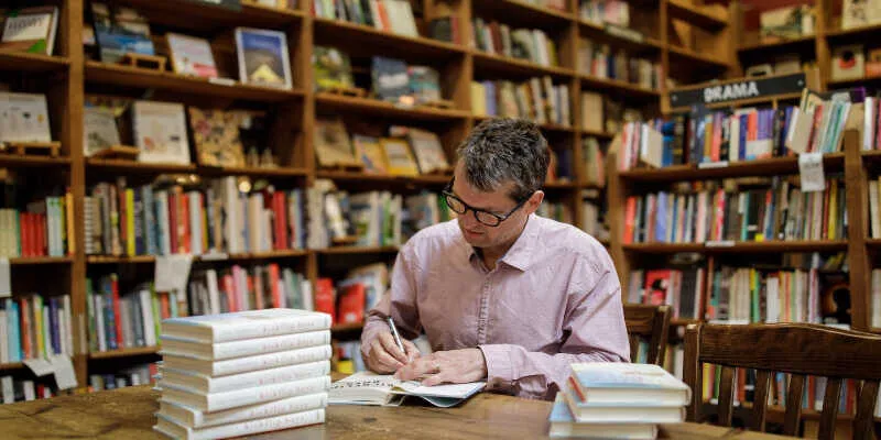 A historical biographer reviewing old documents